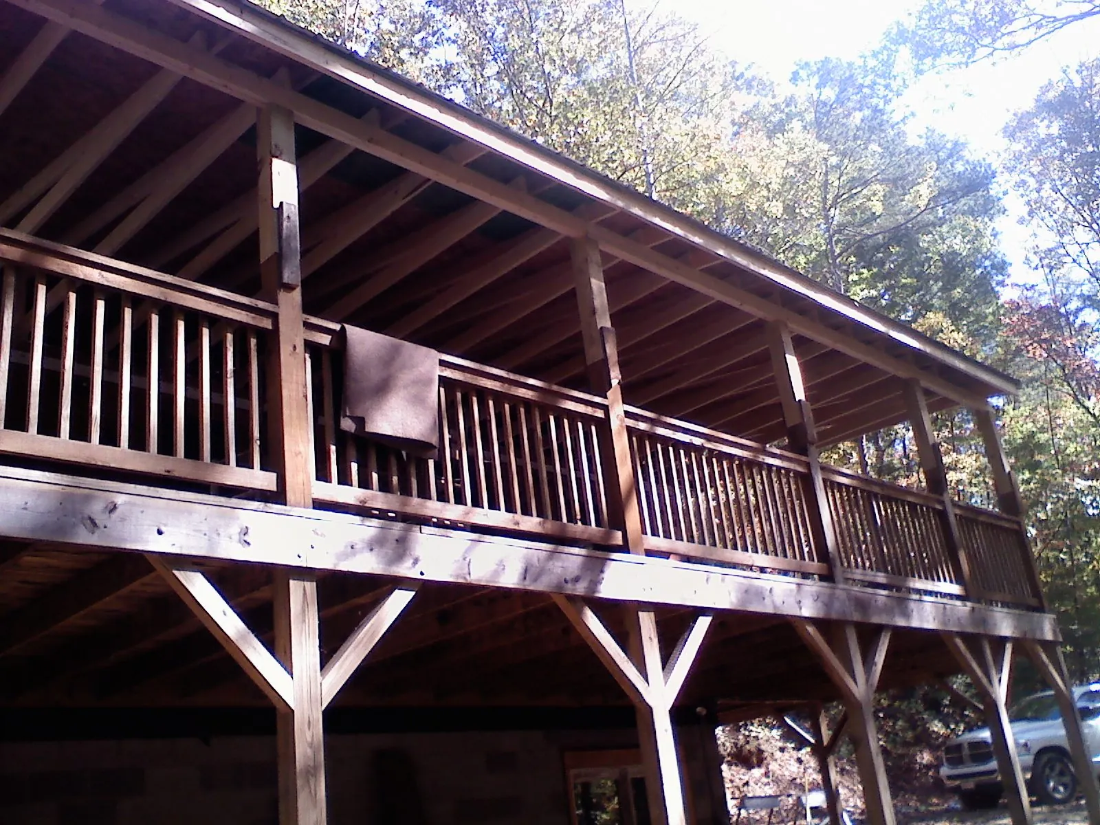 Timber framing under a new elevated porch and deck — Roof Leak Repair in Mentcle by Roofing Brothers